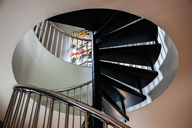 This spiral staircase allows easy access between the ground floor space and the first floor.