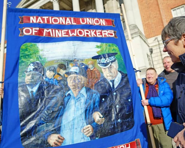 Kathryn Webley is reunited with the banner she painted as a teenager depicting Arthur Scargill's arrest at Orgreave during the miners' strike of 1964.