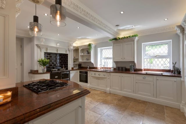 The property is a beautiful mix of old and new, with this incredibly finished, bright, modern kitchen wonderfully contracting the traditional appearance of the formal dining room.