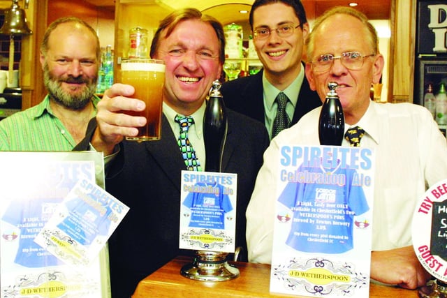 Allan Wood, Howard Borrell, Matthew Blain and Jim Wilcock toast the arrival of a special Spireites beer