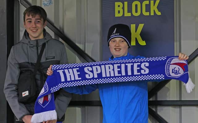 Two young fans gather before Chesterfield's 3-0 defeat at Solhull on New Year's Day 2020.