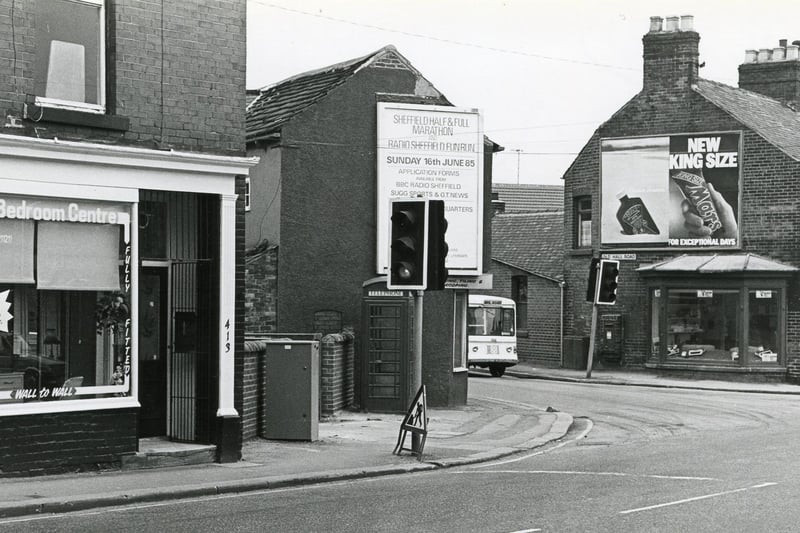 This picture shows the junction of Chatsworth Road and Old Hall Road, which has now been replaced with a roundabout. The old-fashioned red public phone box is visible behind the traffic light