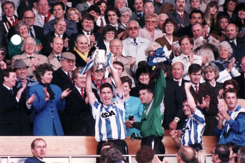 Nigel Pearson lifts the League Cup after Sheffield Wednesday's 1-0 win