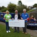 Lynn Jones, representing Ashgate Hospice; Alan Goodall, president of the Rotary Club of Scarsdale Chesterfield; David Blackburn, towpath officer for the Chesterfield Canal Trust.