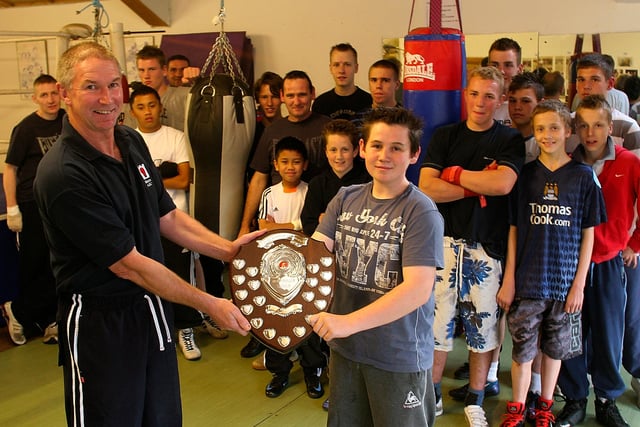 Buxton Boxing Club presentation of the Montpelier Shield for best effort in the training gym, chairman Gary Thompson to Tom Carter in 2008