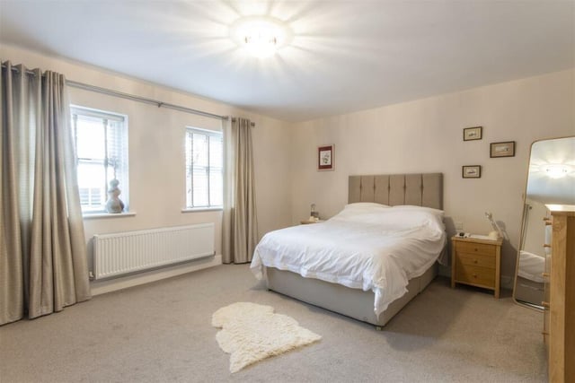 This generous double bedroom has a walk-in wardobe/dressing room and an ensuite shower room.
