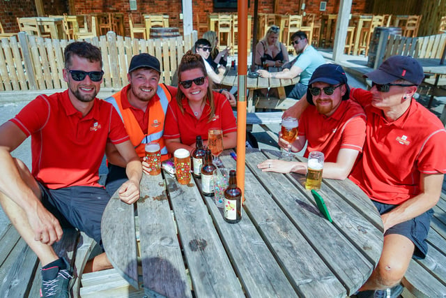 Royal Mail colleagues enjoy a well earned drink in the Spotted Frog beer garden.