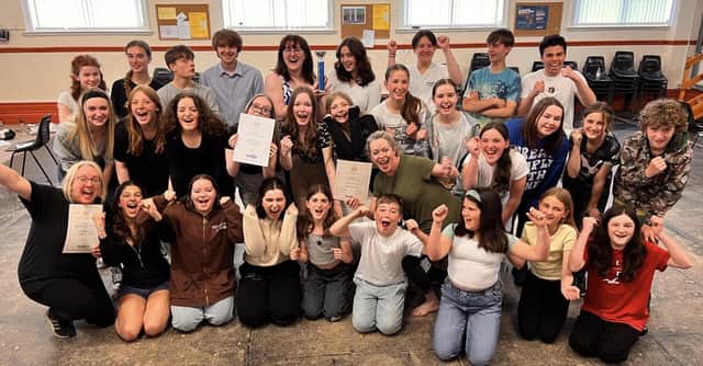 Long Eaton Operatic Society's Youth Group celebrate their NODA awards.