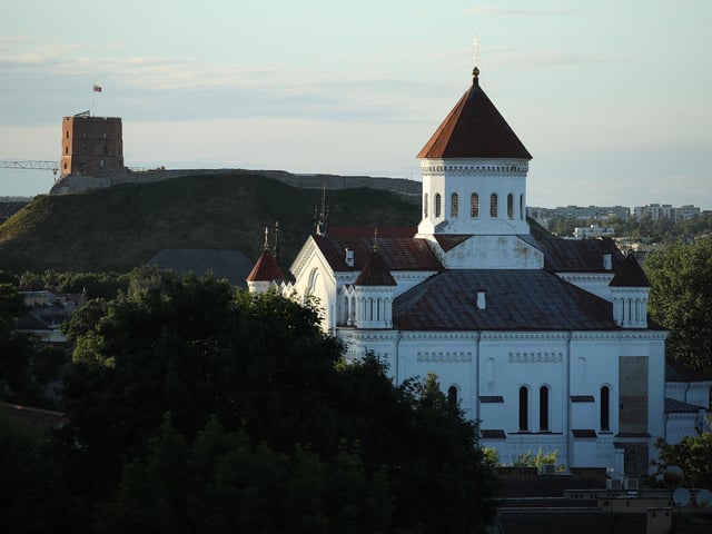 The Orthodox Cathedral of Theotokos stands as Gediminas Castle Tower is seen behind in Vilnius, the capital of Lithuania. Flights to Vilnius are available from Doncaster Sheffield Airport.