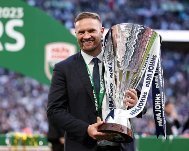 Ian Evatt with the Papa John's Trophy. Picture: Getty.