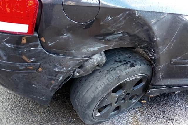 Pictures show the damage to Tracy's car which was hit by the taxi driver