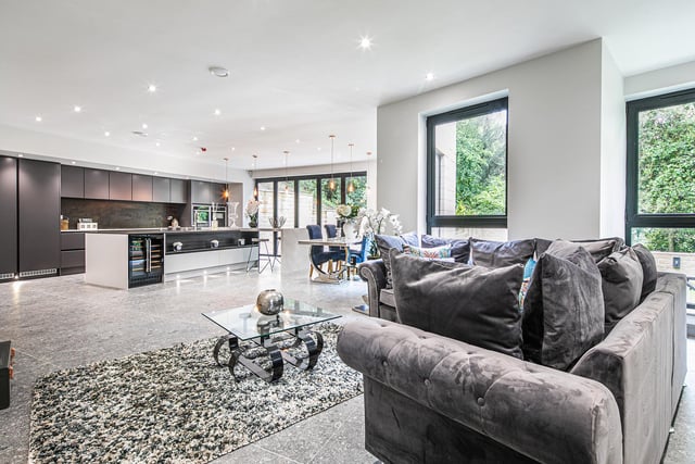 The open-plan kitchen and living area emphasises the home's light, spacious and versatile feel.