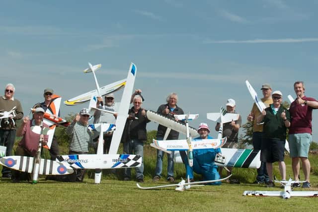 Keith Newman, right, and members of the Lea Fields Model Aircraft Club.
