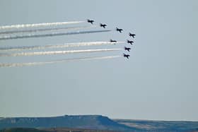 Red Arrows flyover seen from the moors over Rowsley Village.