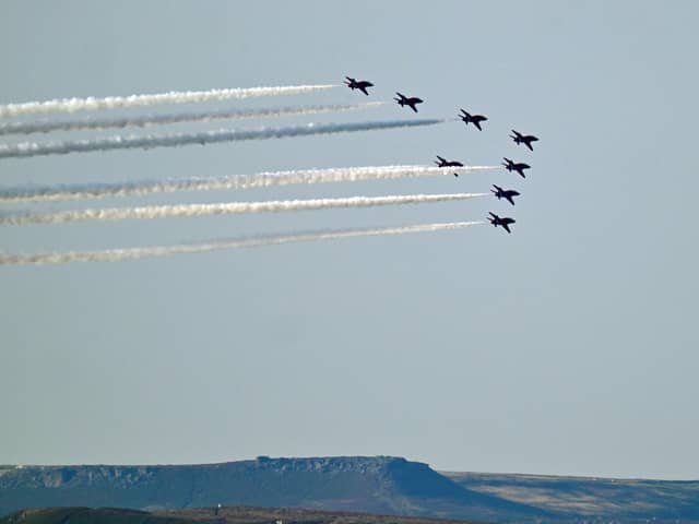 Red Arrows flyover seen from the moors over Rowsley Village.
