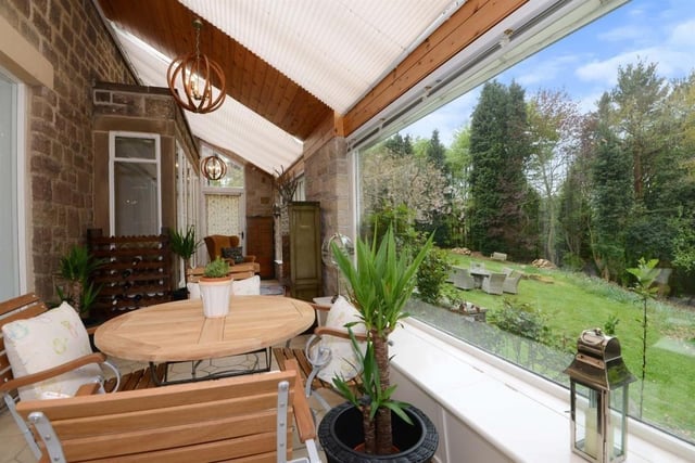 Stunning views of the rear garden can be enjoyed from this large conservatory where French doors give access to the grounds.