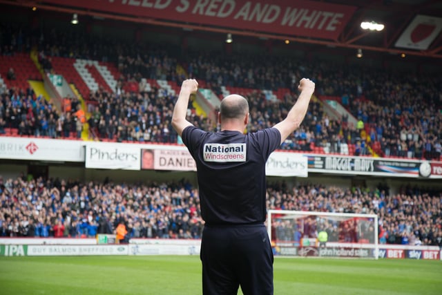 Paul Cook shows his appreciation to the Blues supporters at Bramall Lane.
