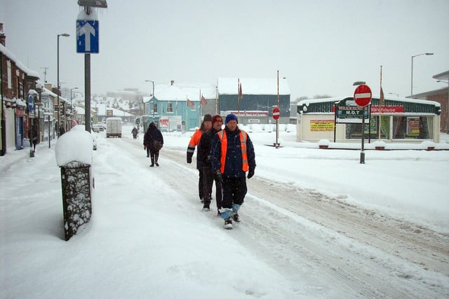 Walking through a snow-covered Chatsworth Road in Chesterfield
