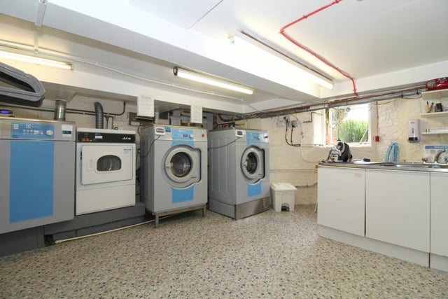 Ample space for washers, dryers and a sink unit.
