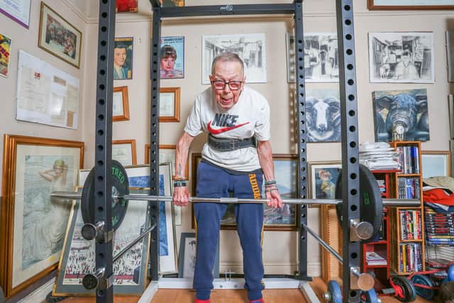 Pumped-up Brian Winslow has been bodybuilding for more than 60 years and still trains six days a week in his home gym.