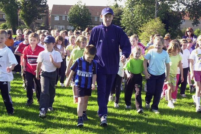 Olympic star John Maycock lead off a sponsored walk  in October 2000