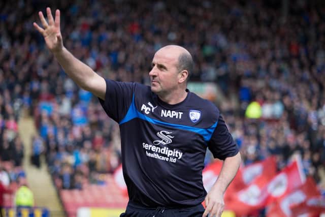 Paul Cook says his 'love' for the Spireites brought him back to the club.
