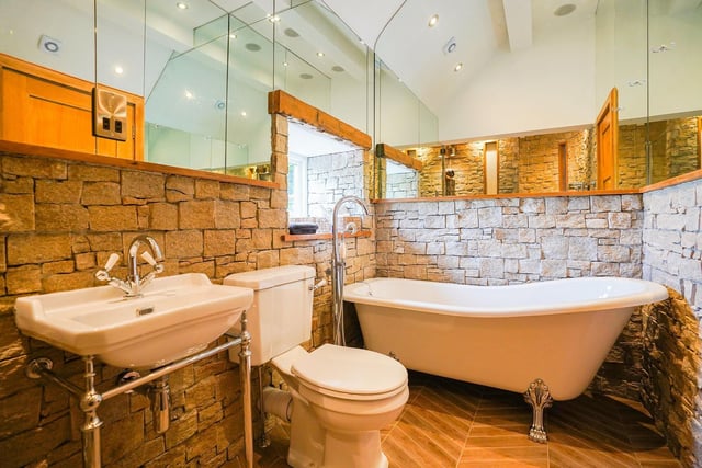 This is one of five bathrooms and features a contemporary finish which is made to impress.