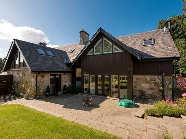 Doors from the living room lead on to a patio, ideal for alfresco dining in the summer.
