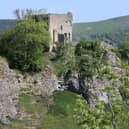 Peveril Castle at Castleton, next to the Peak Cavern lead mine, which overlooks the Joule Yard cemetery