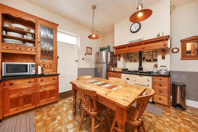The traditional kitchen features an Aga