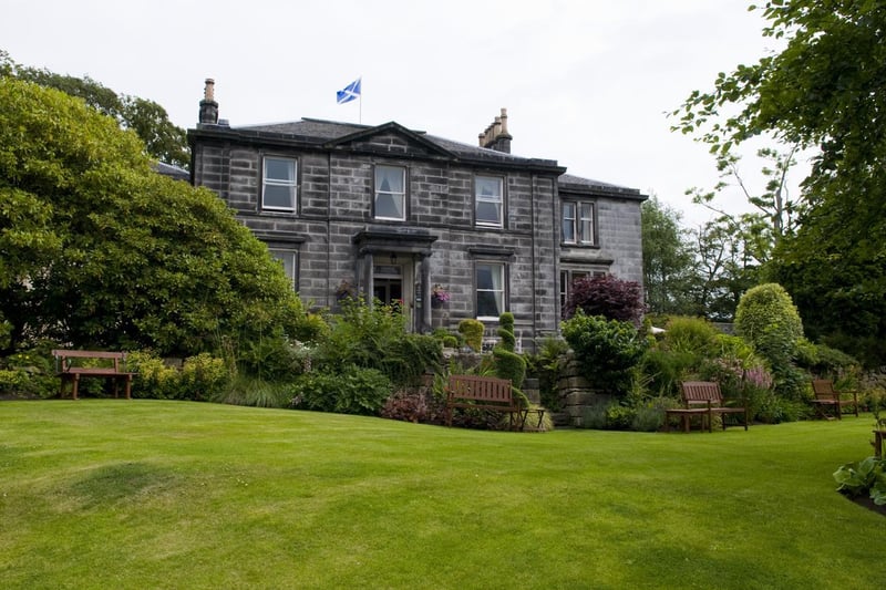 A favourite for weddings, 200-year-old family-run Garvock House Hotel stands amidst lush gardens overlooking historic Dunfermline.