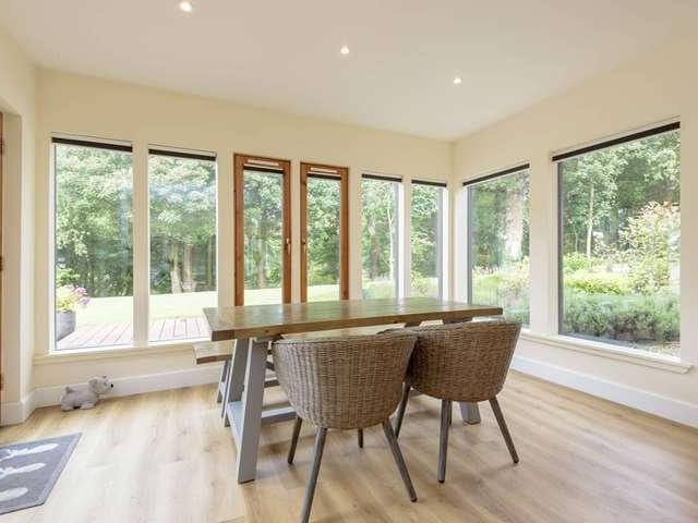 The living room is open plan and includes a dining area, which also had views out to the garden.