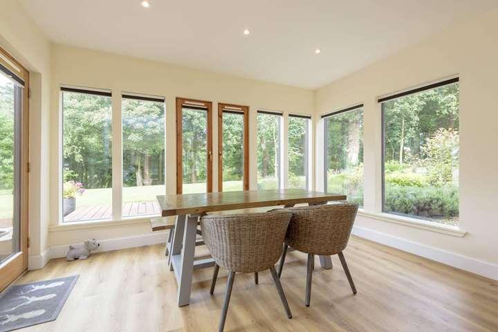 The living room is open plan and includes a dining area, which also had views out to the garden.