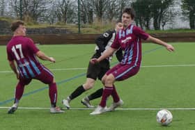 Action from Clowne Comets (maroon and blue) against Spartans Reserves. Photos by Martin Roberts.