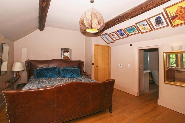 Exposed ceiling beams are a nod to the cottage's earlier years.