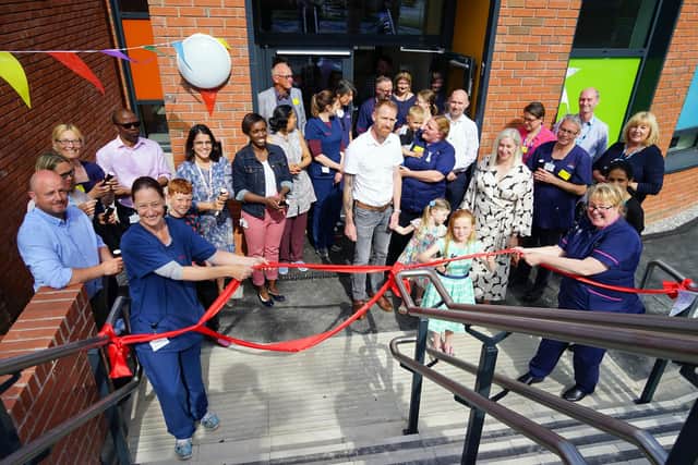 Thea Cutting the ribbon at Chesterfield Royal Hospital's new paediatric unit