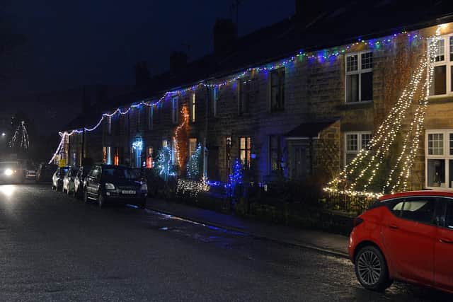Peak District villages all lit up with Christmas lights. Grindleford.