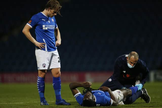 Akwasi Asante went off with a knee injury against Boreham Wood on Tuesday night.