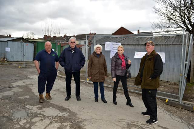 Shayne McCarron, Ken Ashton, Margaret Ashton, Veronica Morris and Stephen Foster are angry about losing the garage site at Catherine Street, Chesterfield. Photo: Rachel Atkins.