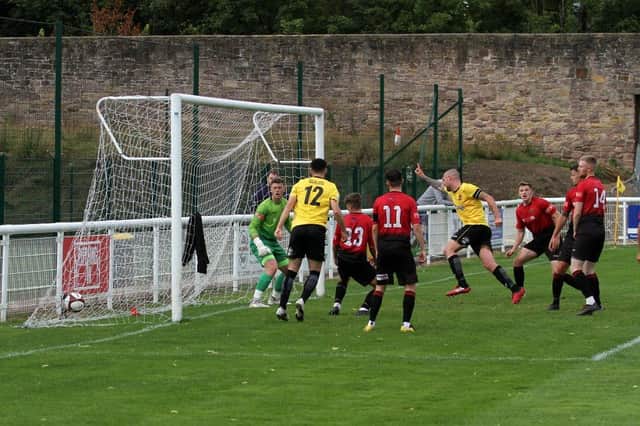 Danny South celebrates scoring Belper's fourth goal against Mickleover. Photo by Mike Smith.