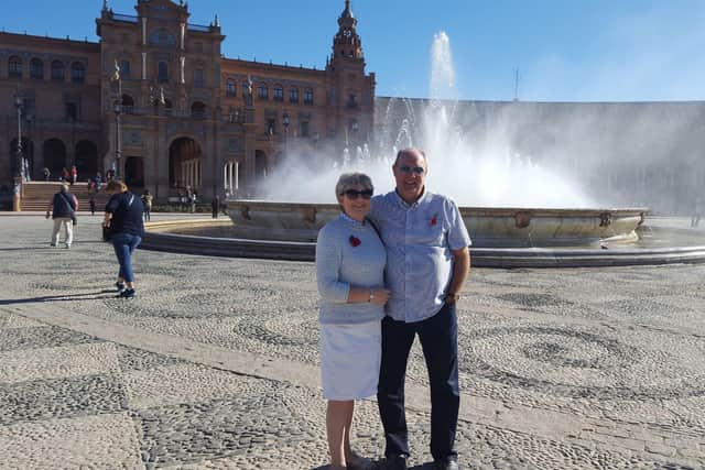 Deborah and Les also made friends through home swapping - for example in Seville, Spain. Above the Chesterfield couple is enjoying the sun at Plaza de España.