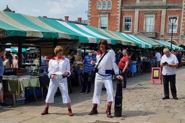The duo were hired by Chesterfield Borough Council to bring joy to shoppers and market traders.