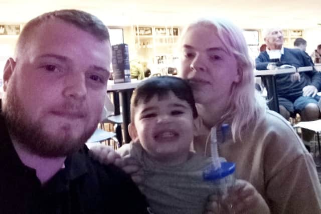 Callum Mchale with Hollie Hulmes and their son.