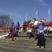 Chesterfield fans soak up the spring sunshine during the Coca-Cola League One match between Brentford and Chesterfield at Griffin Park. The fortunes of both clubs has been very different since that day.