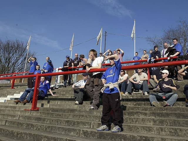 Chesterfield fans soak up the spring sunshine during the Coca-Cola League One match between Brentford and Chesterfield at Griffin Park. The fortunes of both clubs has been very different since that day.
