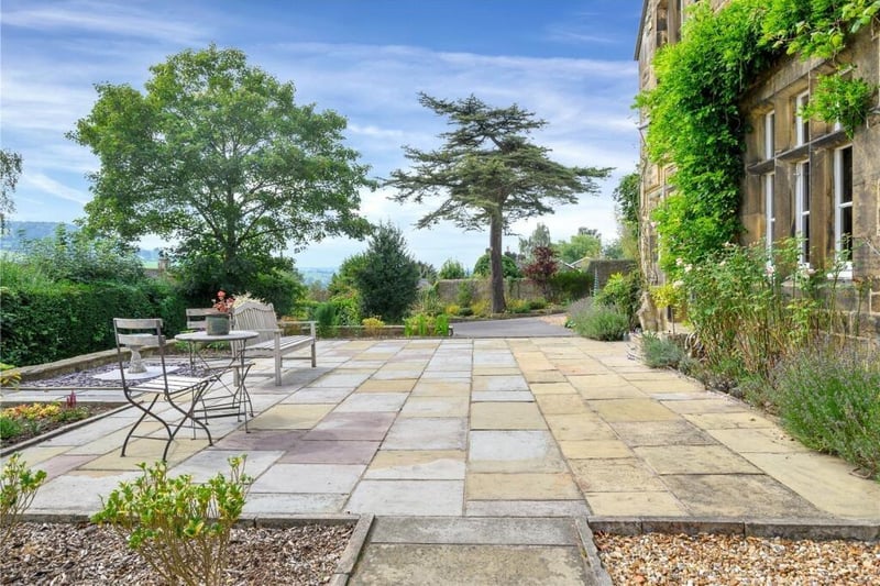 A stone flagged terrace at front of the house is perfect for alfresco dining or drinks.