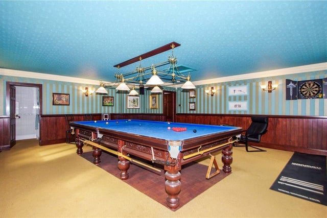 Cue up in this fantastic games room