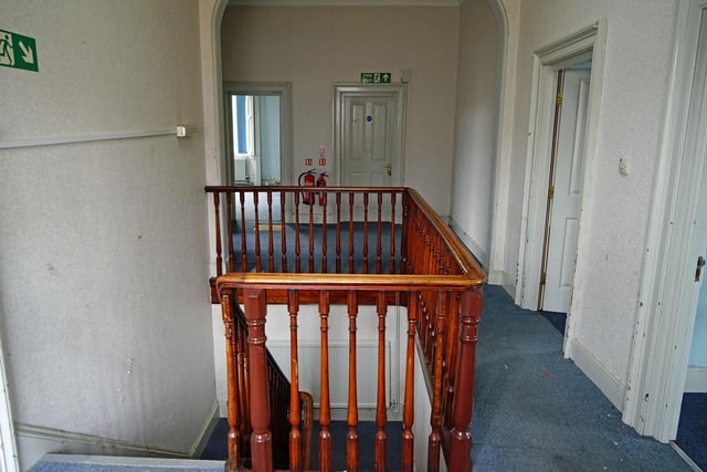 Multiple rooms lead off the landing which is accessed via a wooden staircase.