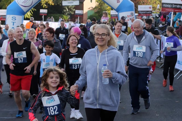 Young and old are pictured at the start of the fun run.