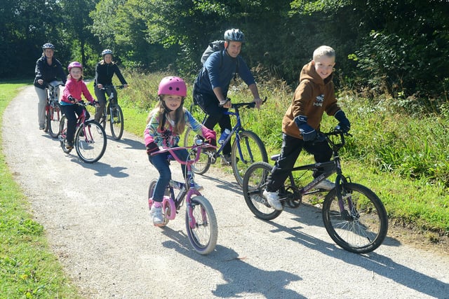 Children and adults enjoy cycling along the smooth terrain surrounding Carsington Water.